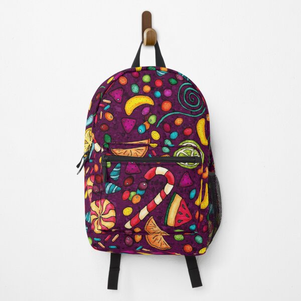 Multicolored candies on a purple background Backpack
