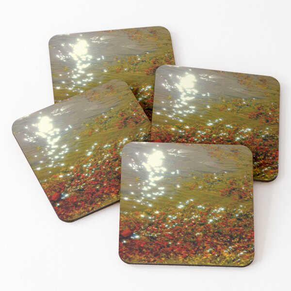 Item preview, Sunlight sparkle on water and vibrant red stones coastal memories designed and sold by glowvim.