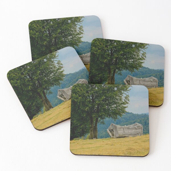 Item preview, Abandoned disintegrating shepherd's hut and a tree in a mountain pasture in Transylvania designed and sold by BZsArt.