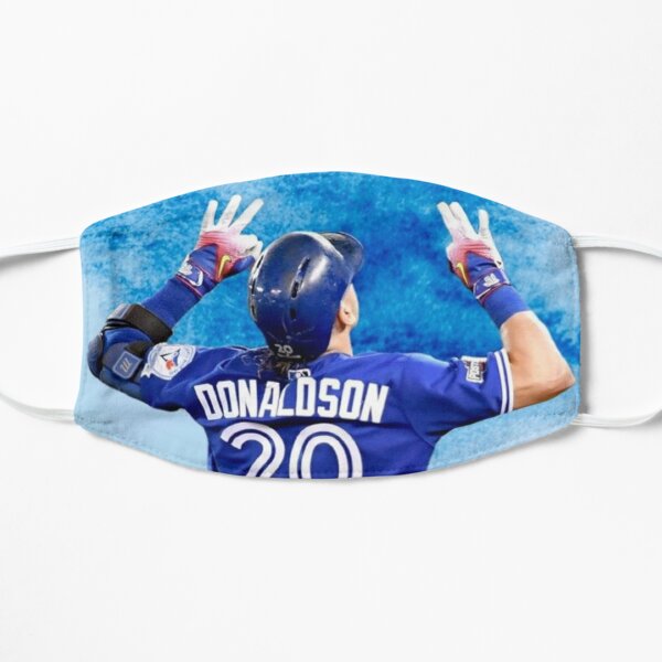 Josh Donaldson #20 of the Toronto Blue Jays puts on his helmet as