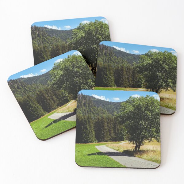 Item preview, Empty small road and tree in Black Forest, Germany designed and sold by svanaerschot.