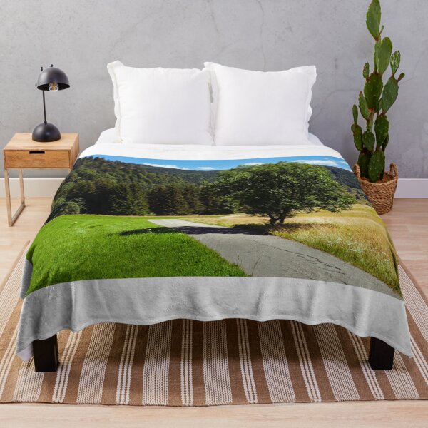 Item preview, Empty small road and tree in Black Forest, Germany designed and sold by svanaerschot.
