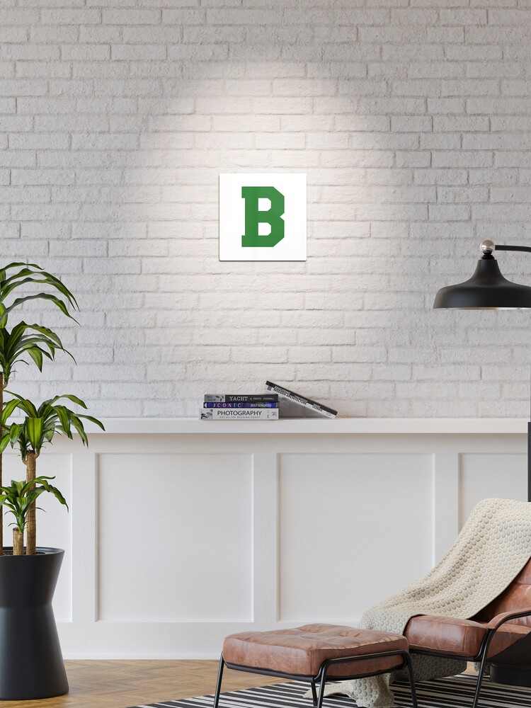 green metal letter b