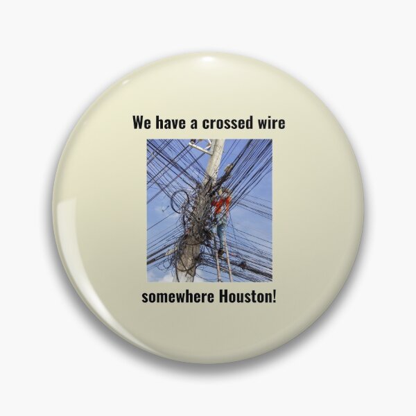Item preview,  "We have a crossed wire" (black text). designed and sold by skoumpourdides.