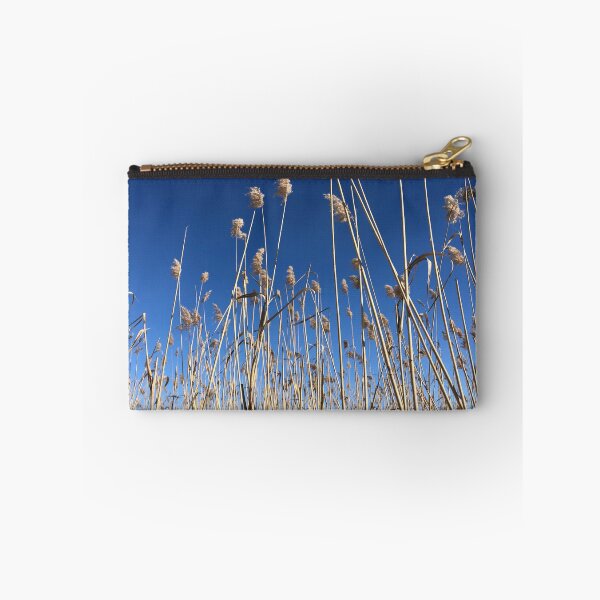 Item preview, Yellow reeds against deep blue sky designed and sold by DeliriousSteve.