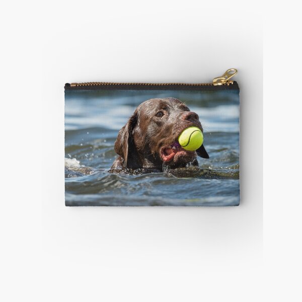 Item preview, Retrieving a tennis ball designed and sold by alan tunnicliffe.