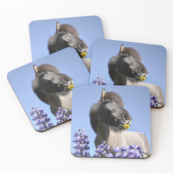 Item preview, Icelandic horse nibbling on some dandelions in a field full of lupins.  designed and sold by Iceland-Effect.