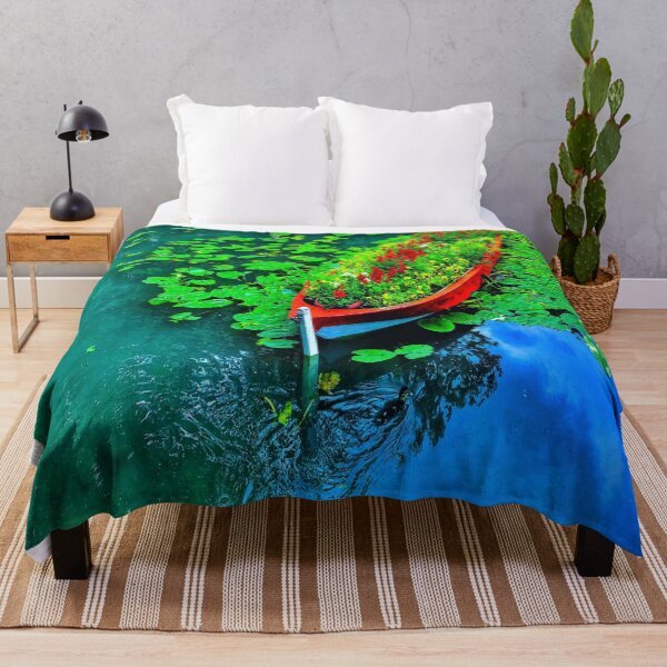 Item preview, boat full of flowers on the lake designed and sold by Mariocii.