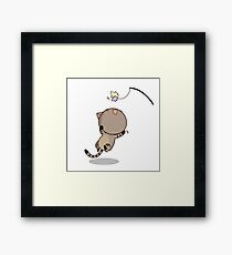 Cat is playing Framed Print