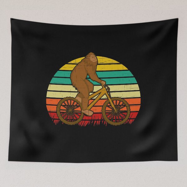 Item preview, Bigfoot Riding a Bike Retro Sunset designed and sold by tpixx.