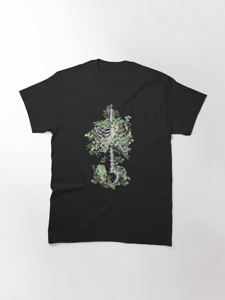 Thumbnail 3 of 7, Classic T-Shirt, Botanical anatomy, rib cage, pelvis, eucalyptus leaves floral skeleton designed and sold by Collagedream.