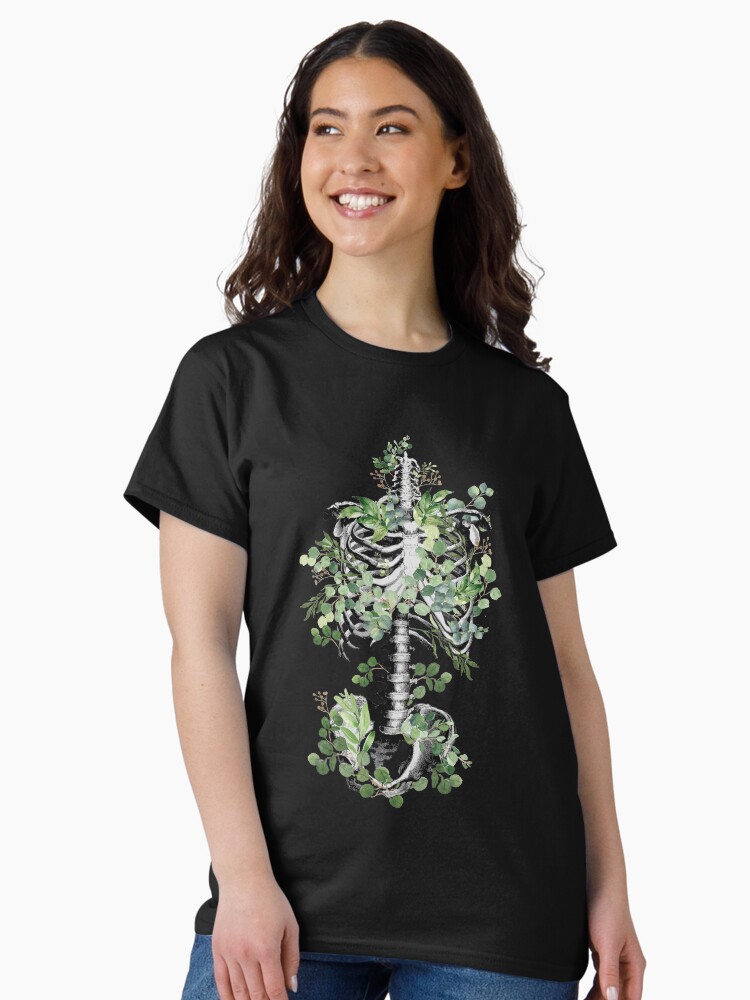Thumbnail 2 of 7, Classic T-Shirt, Botanical anatomy, rib cage, pelvis, eucalyptus leaves floral skeleton designed and sold by Collagedream.
