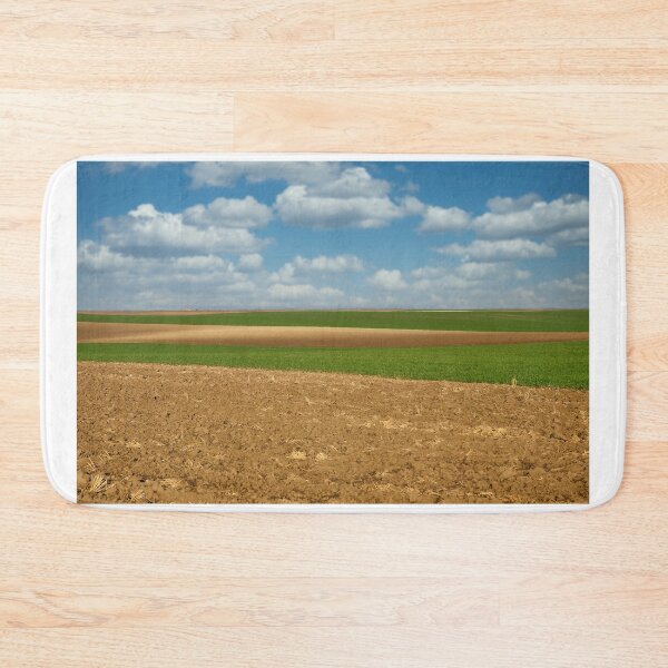 Item preview, plowed and young green wheat field landscape  designed and sold by goceris.