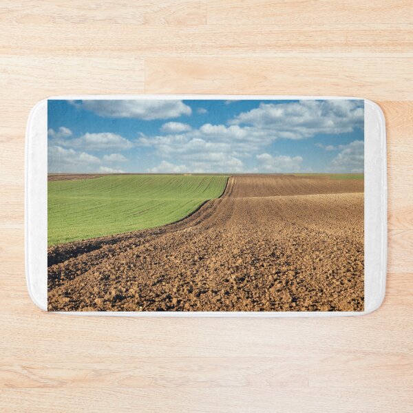 Item preview, plowed field and young green wheat landscape  designed and sold by goceris.