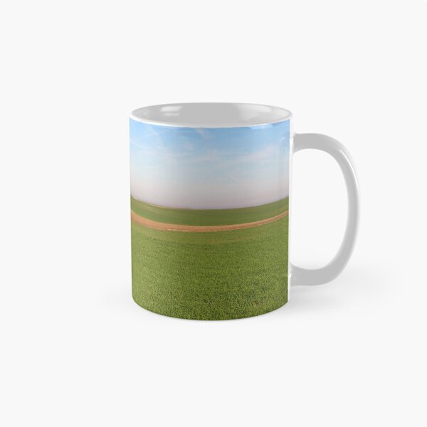 Item preview, Young green wheat field landscape  designed and sold by goceris.