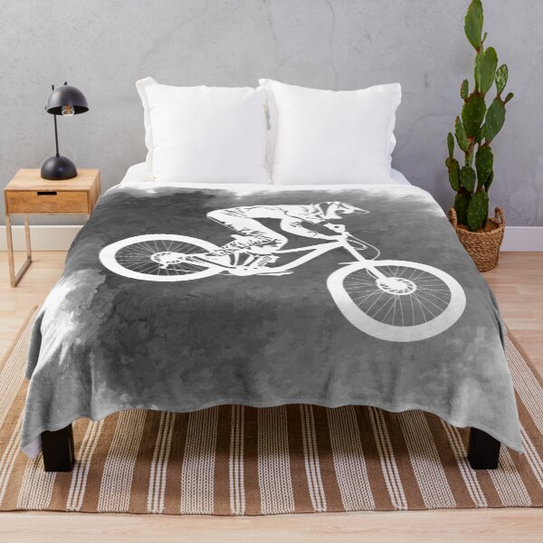 Item preview, Silhouette of a cyclist on a mountain bike on an abstract background designed and sold by Dobrydnev.