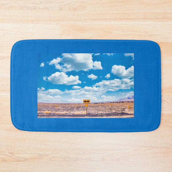 Item preview, Directional sign in the desert with scenic blue sky and wide horizon. Concept for trip, freedom and transportation.  designed and sold by Paolo Modena Photography    -   Fine Italian Art.