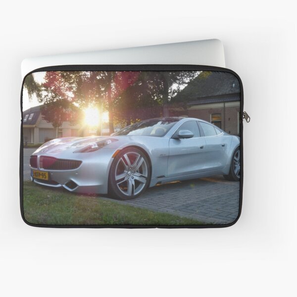 2012 Fisker Karma electric supercar against a sunset Laptop Sleeve