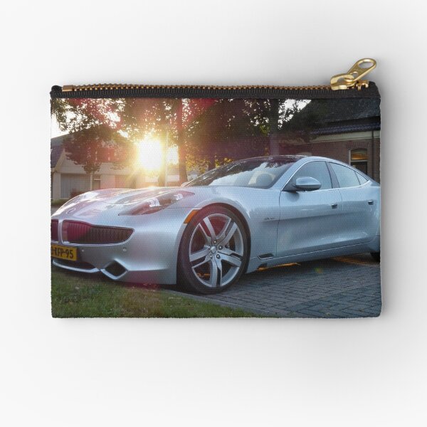 2012 Fisker Karma electric supercar against a sunset Zipper Pouch