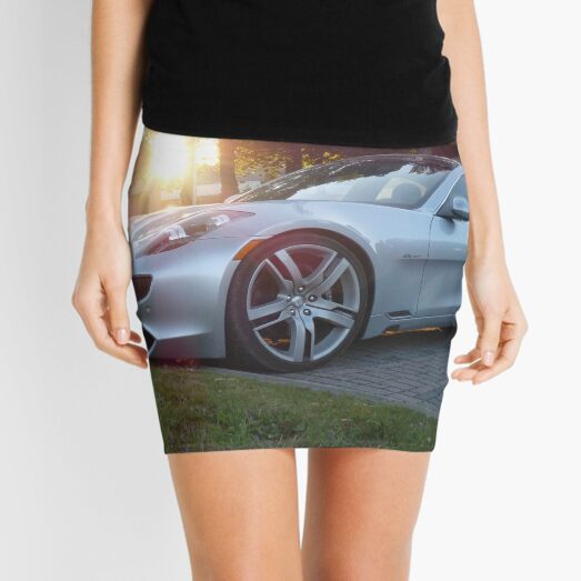 2012 Fisker Karma electric supercar against a sunset Mini Skirt