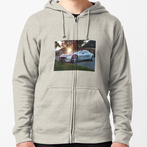 2012 Fisker Karma electric supercar against a sunset Zipped Hoodie