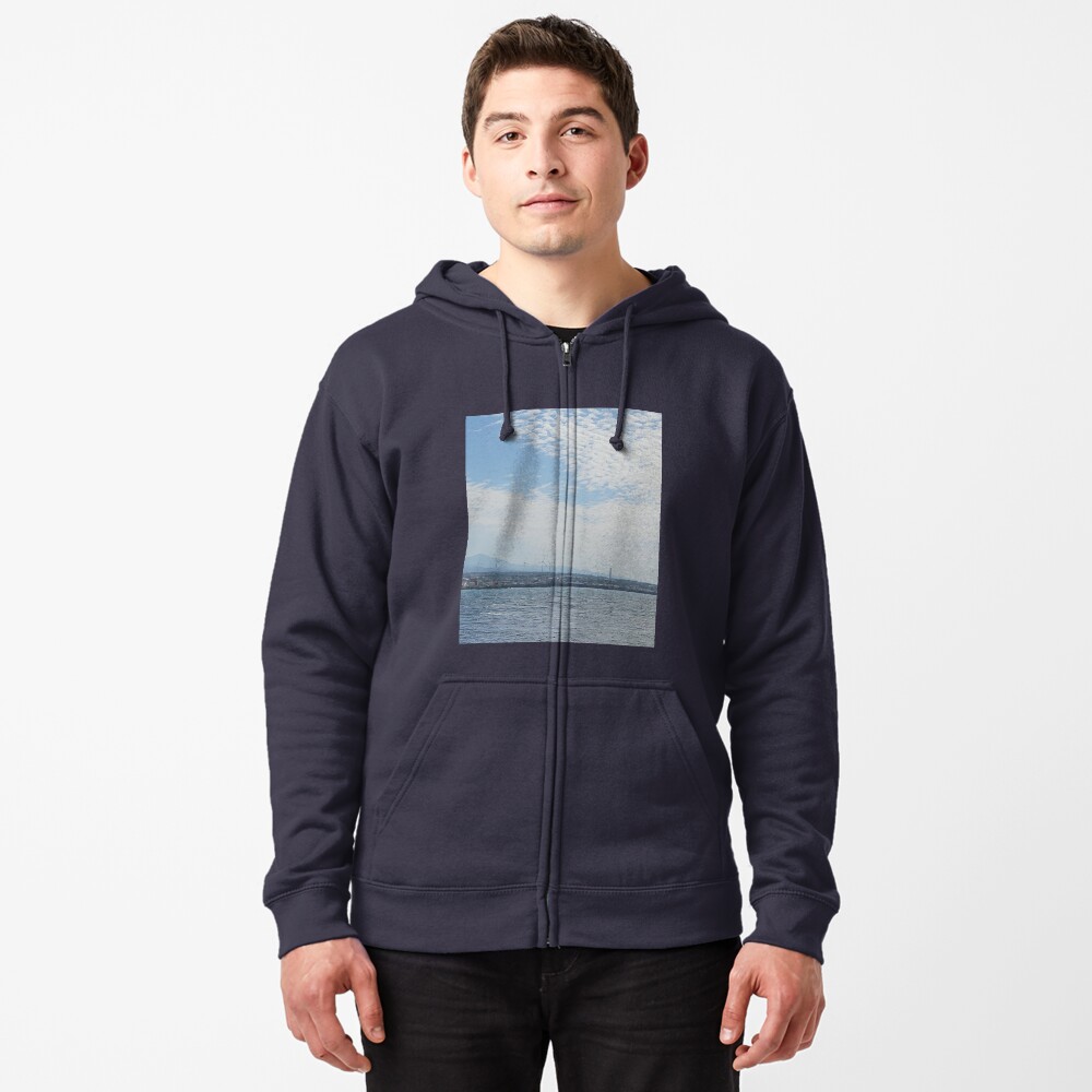 The shape of the fine feathery clouds in the eastern sky of Jeju is amazing, Jeju Island.Korea. Zipped Hoodie