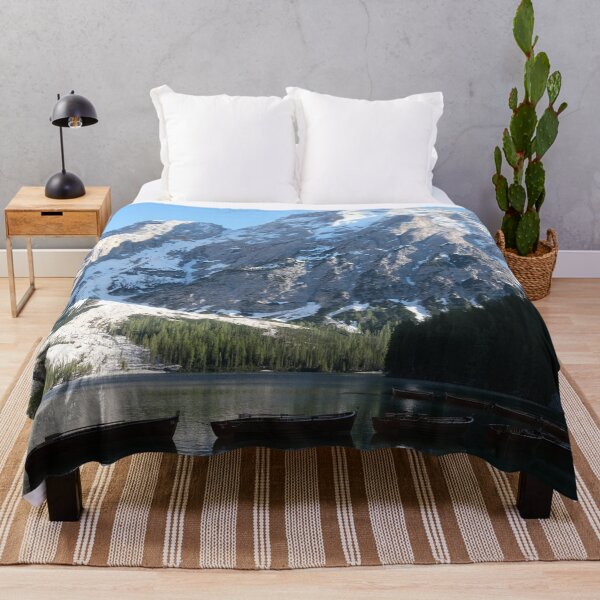 Item preview, The fabulous alpine lake of Braies in the Dolomites (Bolzano). Lovely place in the Italian Alps. Boats on the water. Reflections in the water. Sunny spring day. Trentino Alto Adige designed and sold by Maurizio Fabbroni.