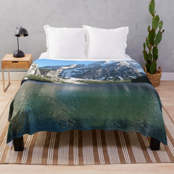 Item preview, The fabulous alpine lake of Braies in the Dolomites (Bolzano). Lovely place in the Italian Alps. Boats on the water. Reflections in the water. Sunny spring day. Trentino Alto Adige designed and sold by Maurizio Fabbroni.