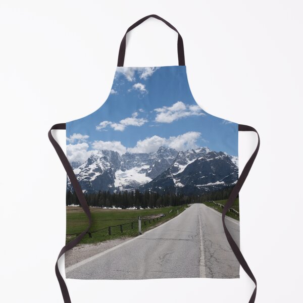 Item preview, A shot on the move from the windshield of an electric car with italian snow-covered alps mountains in front of it. Sunny spring day. POV first person view shot on a mountain road. No people. designed and sold by Maurizio Fabbroni.