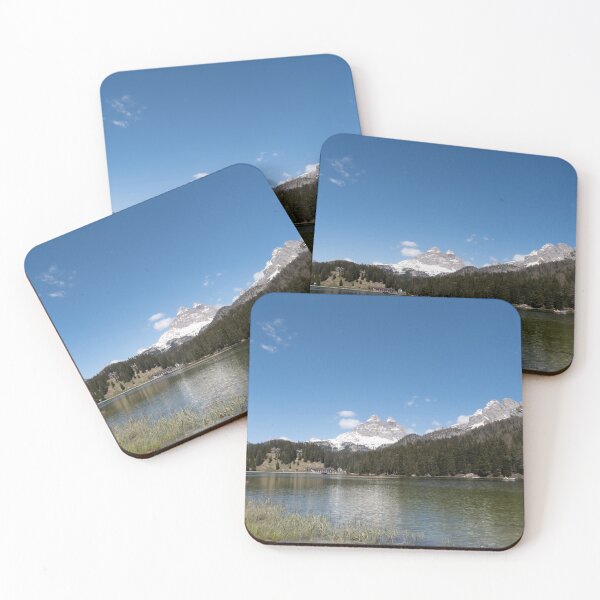 Item preview, The fabulous alpine lake of Misurina in the Dolomites. Boat on the water. Lovely and relaxing place in the Italian Alps. Reflections in the rippled water. Sunny spring day. designed and sold by Maurizio Fabbroni.