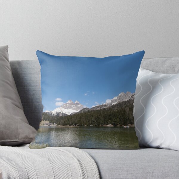 Item preview, The fabulous alpine lake of Misurina in the Dolomites. Boat on the water. Lovely and relaxing place in the Italian Alps. Reflections in the rippled water. Sunny spring day. designed and sold by Maurizio Fabbroni.