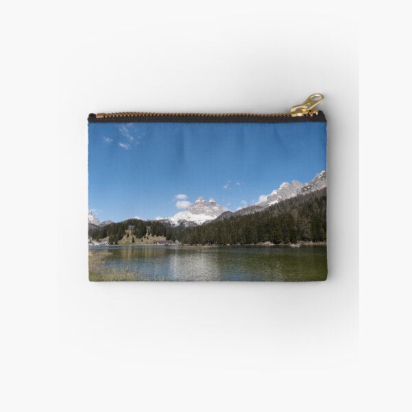 Item preview, The fabulous alpine lake of Misurina in the Dolomites. Boat on the water. Lovely and relaxing place in the Italian Alps. Reflections in the rippled water. Sunny spring day. designed and sold by Maurizio Fabbroni.
