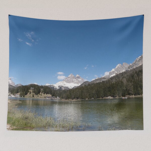Item preview, The fabulous alpine lake of Misurina in the Dolomites. Boat on the water. Lovely and relaxing place in the Italian Alps. Reflections in the rippled water. Sunny spring day. designed and sold by Maurizio Fabbroni.