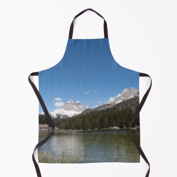 Item preview, The fabulous alpine lake of Misurina in the Dolomites. Boat on the water. Lovely and relaxing place in the Italian Alps. Reflections in the rippled water. Sunny spring day. designed and sold by Maurizio Fabbroni.