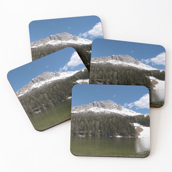 Item preview, The fabulous alpine lake of Misurina in the Dolomites. Boat on the water. Lovely and relaxing place in the Italian Alps. Reflections in the rippled water. Sunny spring day. designed and sold by Maurizio Fabbroni.