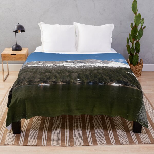 Item preview, The fabulous alpine lake of Misurina in the Dolomites. Boat on the water. Lovely and relaxing place in the Italian Alps. Reflections in the rippled water. Sunny spring day. designed and sold by Maurizio Fabbroni.