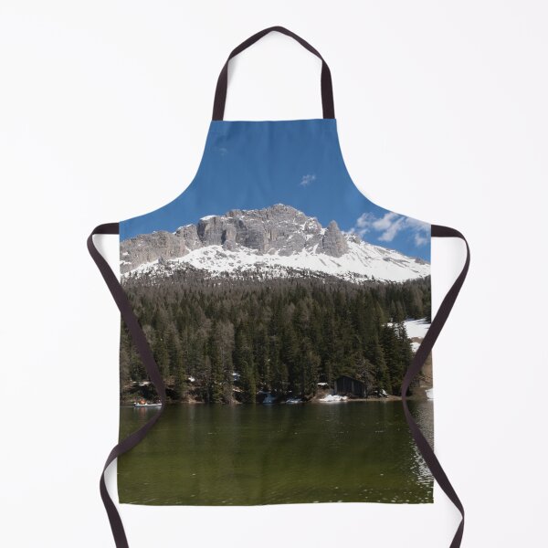Item preview, The fabulous alpine lake of Misurina in the Dolomites. Boat on the water. Lovely and relaxing place in the Italian Alps. Reflections in the rippled water. Sunny spring day. designed and sold by Maurizio Fabbroni.