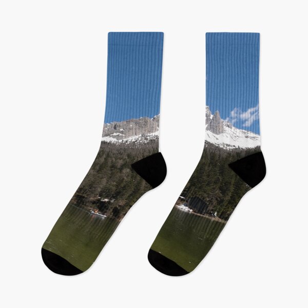 Item preview, The fabulous alpine lake of Misurina in the Dolomites. Boat on the water. Lovely and relaxing place in the Italian Alps. Reflections in the rippled water. Sunny spring day. designed and sold by Maurizio Fabbroni.