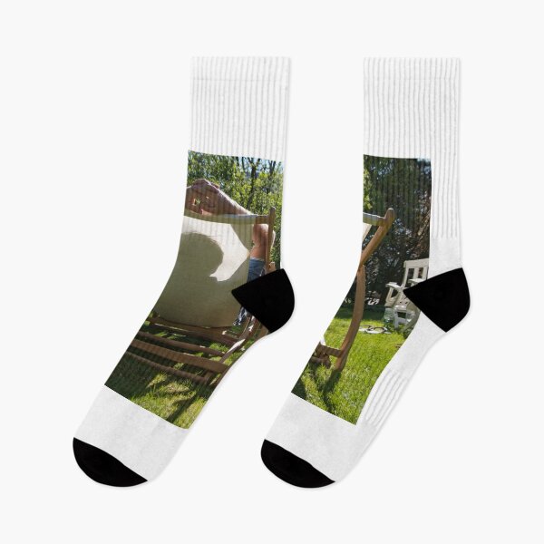 Item preview, A couple in deck chairs designed and sold by Martin Langer.