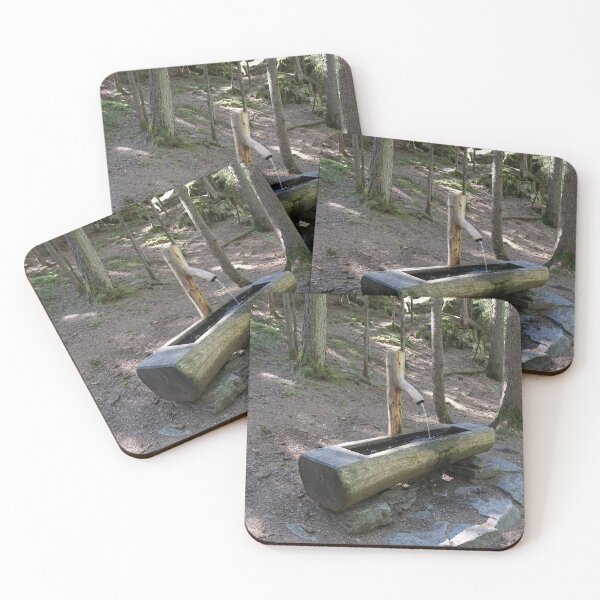Item preview, The fabulous alpine waterfalls of Riva in the Dolomites (Campo Tures). Path of San Francesco; wood fountain, fresh water. Lovely place in the Alps. Sunny spring day with no people. Trentino Alto Adige designed and sold by Maurizio Fabbroni.