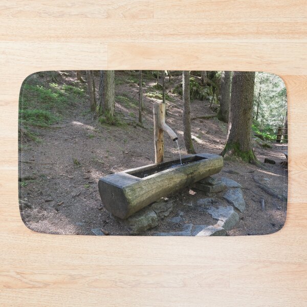 Item preview, The fabulous alpine waterfalls of Riva in the Dolomites (Campo Tures). Path of San Francesco; wood fountain, fresh water. Lovely place in the Alps. Sunny spring day with no people. Trentino Alto Adige designed and sold by Maurizio Fabbroni.