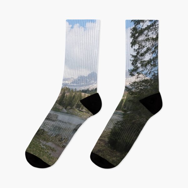 Item preview, The fabulous alpine lake of Carezza in the Dolomites (Bolzano). Lovely place in the Italian Alps. Reflections in the water. View from the shore. Sunny spring day. Trentino Alto Adige designed and sold by Maurizio Fabbroni.