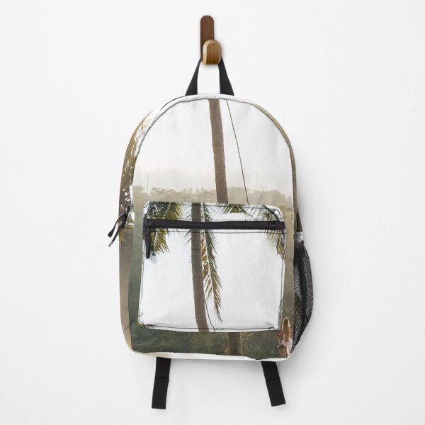 Item preview, Photograph of a swing set in the nature of Bali with green palmtrees designed and sold by KIKAIA The Label.
