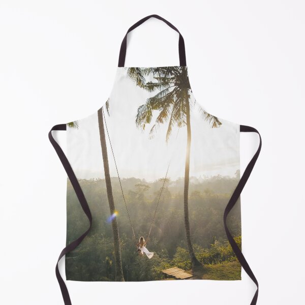 Item preview, Photograph of a swing set in the nature of Bali with green palmtrees designed and sold by KIKAIA The Label.
