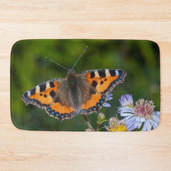 Item preview, Common tortoiseshell butterfly on a leaf in the summer.  designed and sold by iCimages.net.