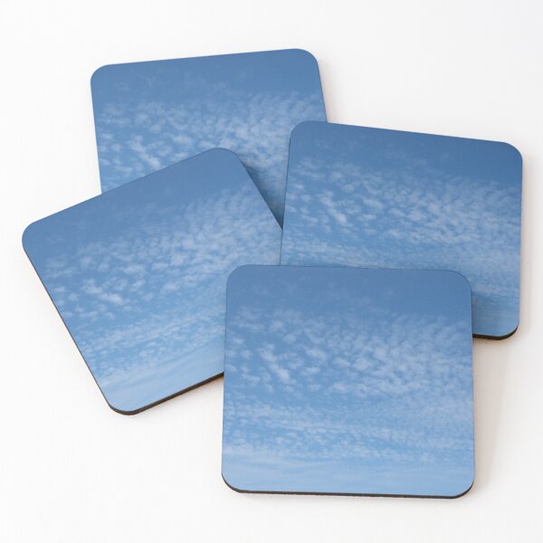 Item preview, Cirrocumulus clouds in blue sky on sunny peaceful spring day. Water in a gaseous state in nature. The atmosphere of the earth. The effect of humidity on agricultural production. The symbol of freedom. designed and sold by Maurizio Fabbroni.
