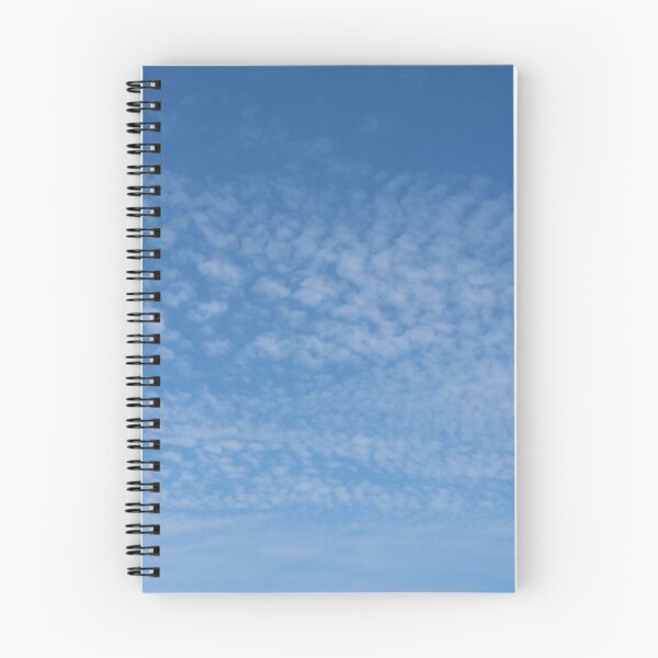 Item preview, Cirrocumulus clouds in blue sky on sunny peaceful spring day. Water in a gaseous state in nature. The atmosphere of the earth. The effect of humidity on agricultural production. The symbol of freedom. designed and sold by Maurizio Fabbroni.