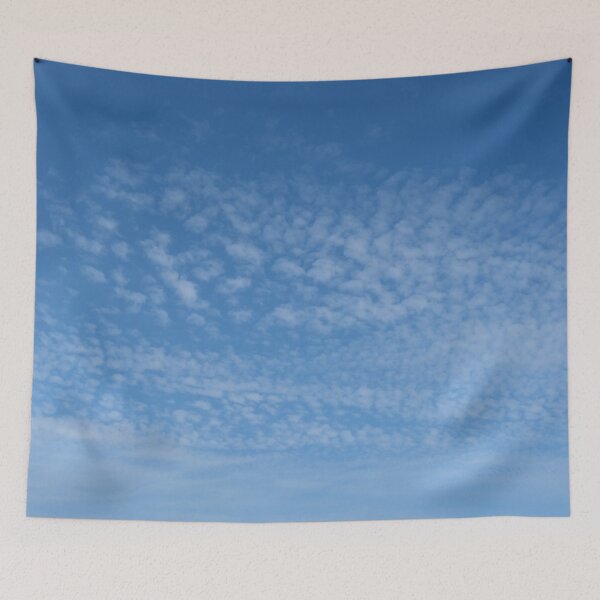 Item preview, Cirrocumulus clouds in blue sky on sunny peaceful spring day. Water in a gaseous state in nature. The atmosphere of the earth. The effect of humidity on agricultural production. The symbol of freedom. designed and sold by Maurizio Fabbroni.