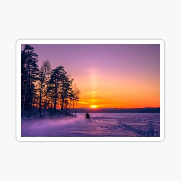 The snow mobile race toward the Sun pillar Sticker