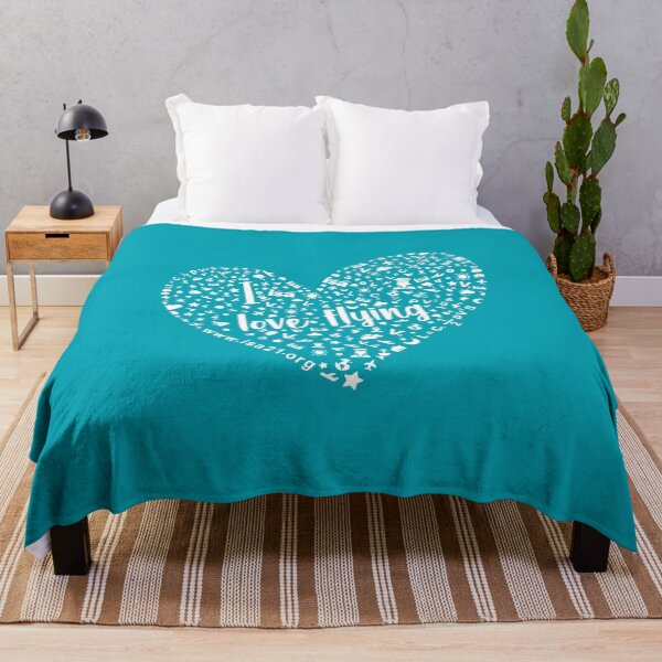 Item preview, I Love Flying in a teal blue sky designed and sold by The International Society of Women Airline Pilots.